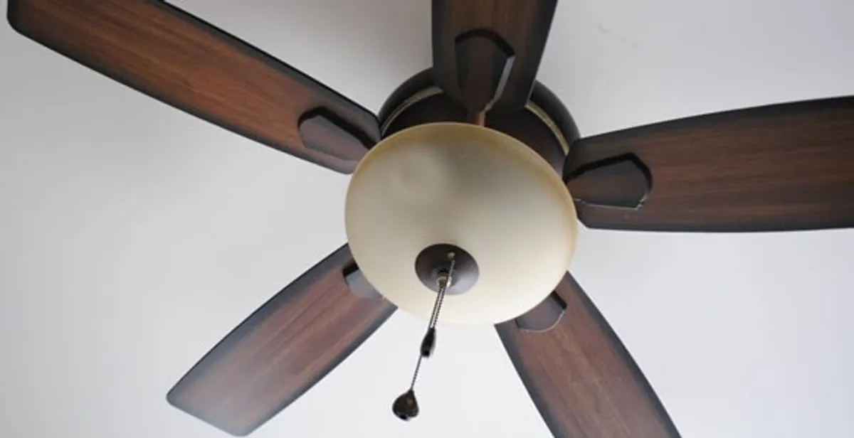 Fully installed ceiling fan with balanced blades and light fixture in Arlington, TX