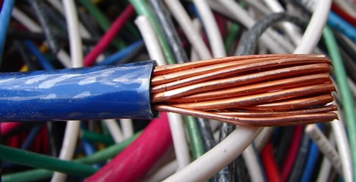 electrical wiring services showing exposed copper conductors and cable preparation in Arlington, TX