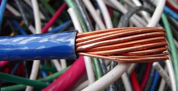electrical wiring services showing exposed copper conductors and cable preparation in Arlington, TX