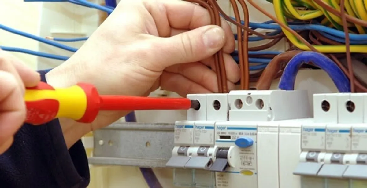 electrician services performing professional electrical panel wiring and connections in Arlington, TX