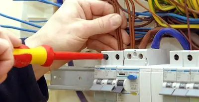 electrician services performing professional electrical panel wiring and connections in Arlington, TX