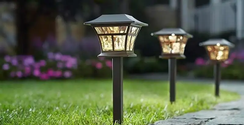 landscape lighting installation services with professionally installed pathway lights in Arlington, TX