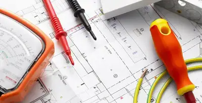 licensed electrician planning and testing electrical systems using professional tools in Arlington, TX