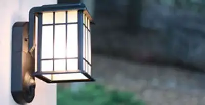 security light installation services with professionally mounted exterior wall light in Arlington, TX