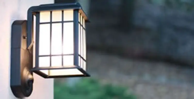 security light installation services with professionally mounted exterior wall light in Arlington, TX