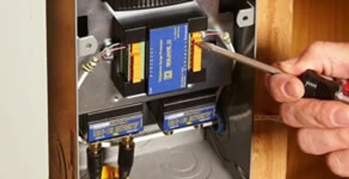 Whole home surge protection device being installed by a licensed electrician to protect electrical systems in Arlington, TX